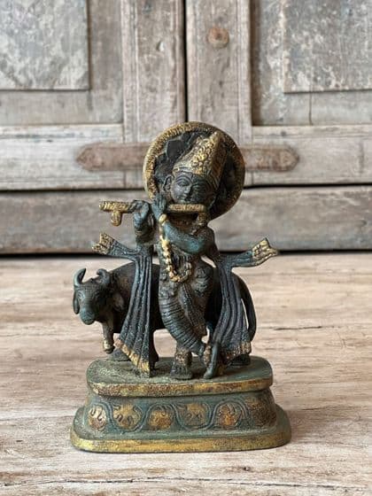 Bronze Casting of Lord Krishna, God of Love with a Nandi Cow