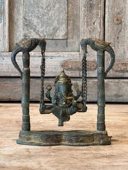 Bronze Ganesha on a Swing with Peacocks