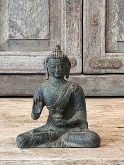 Buddha cast in bronze with Hand Mudra in the Vitarka Discussion Pose