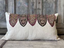 Cushion made from Vintage French linen and an embroidered toran decoration