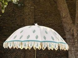 hand block print parasol with aqua flower motif and cypress trees