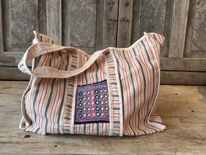 Hand-loomed cloth tote bag with vintage mirror-work embellishment 