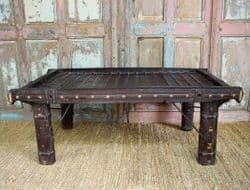old tribal wooden coffee table