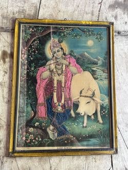 Painting depicting Lord Krishna, God of Love with fabric decoration