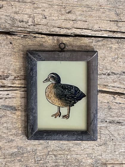 small glass painting of a duck