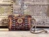Vintage afghan textile bag embellished with old rupee coins