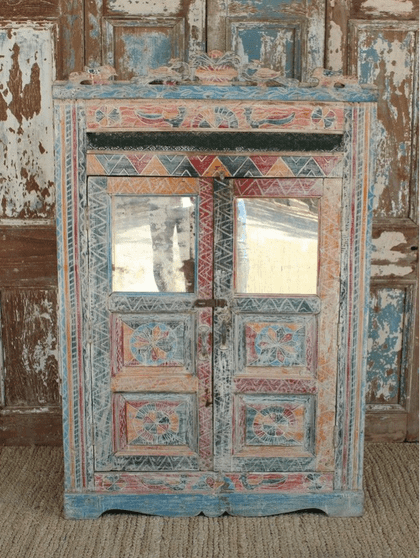 vintage almirah with decorative paint tones, peacocks & vintage mirror