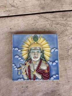 Vintage Ceramic tile depicting Lord Krishna playing a flute