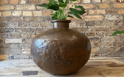 vintage copper water vessel