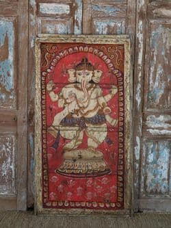 Vintage Painted Artwork of Lord Ganesha in a tribal style on a teak door