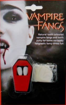 Vampire Fangs in Coffin