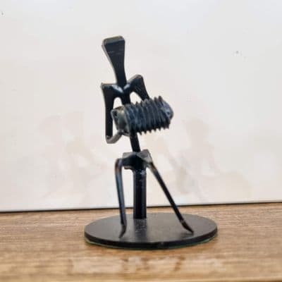Single Concertina Player Horseshoe Nail Figurine