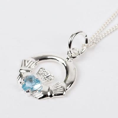 Sterling Silver Claddagh Birthstone Pendant with Blue Topaz CZ