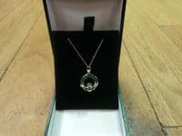 Sterling Silver Claddagh Pendant with Emerald Green CZ Stones