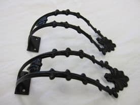 2 Black metal curtain holdbacks open fret design - Arm style hold backs