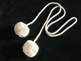 One pair of casual fluffy pom pom connected by 114cm rope Fabric curtain ties tiebacks