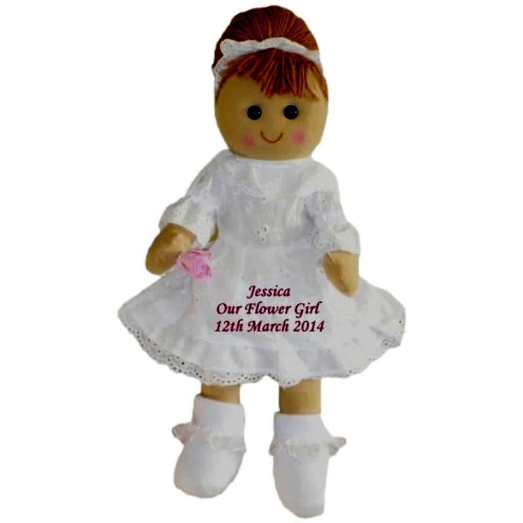 Personalised Wedding Dolls Personalised rag dolls dressed as flower girl, bridesmaid and pageboy, each customised with embroidered names and detailed outfits.