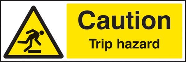 24214M Caution trip hazard Self Adhesive Vinyl (600x200mm) Safety Sign