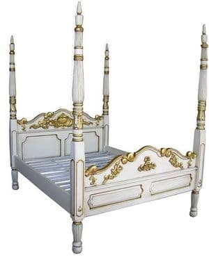 A Four Poster Bed with Gold Highlights