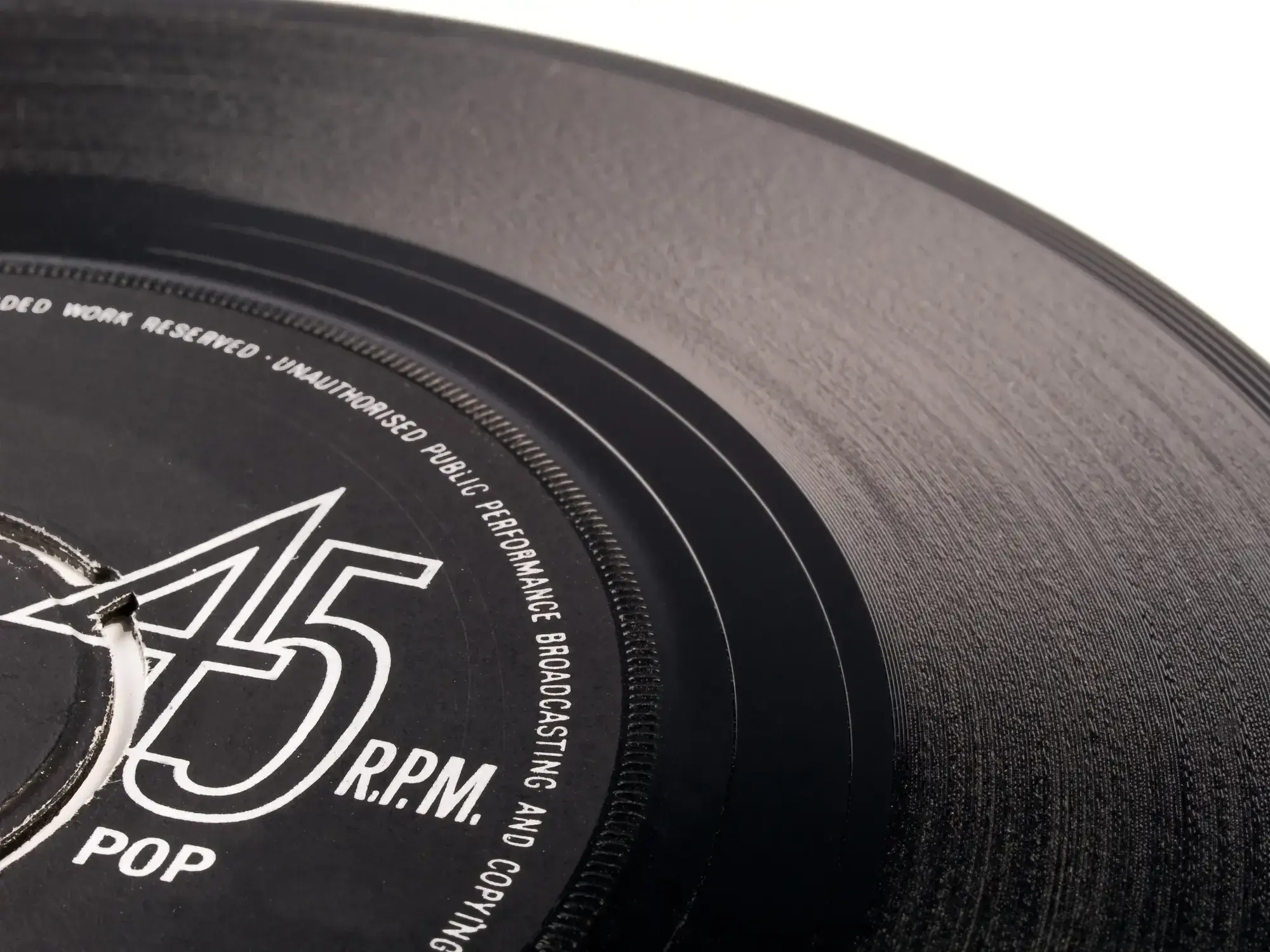 Excellent condition record showing a shiny surface with only a few very faint paper scuffs.