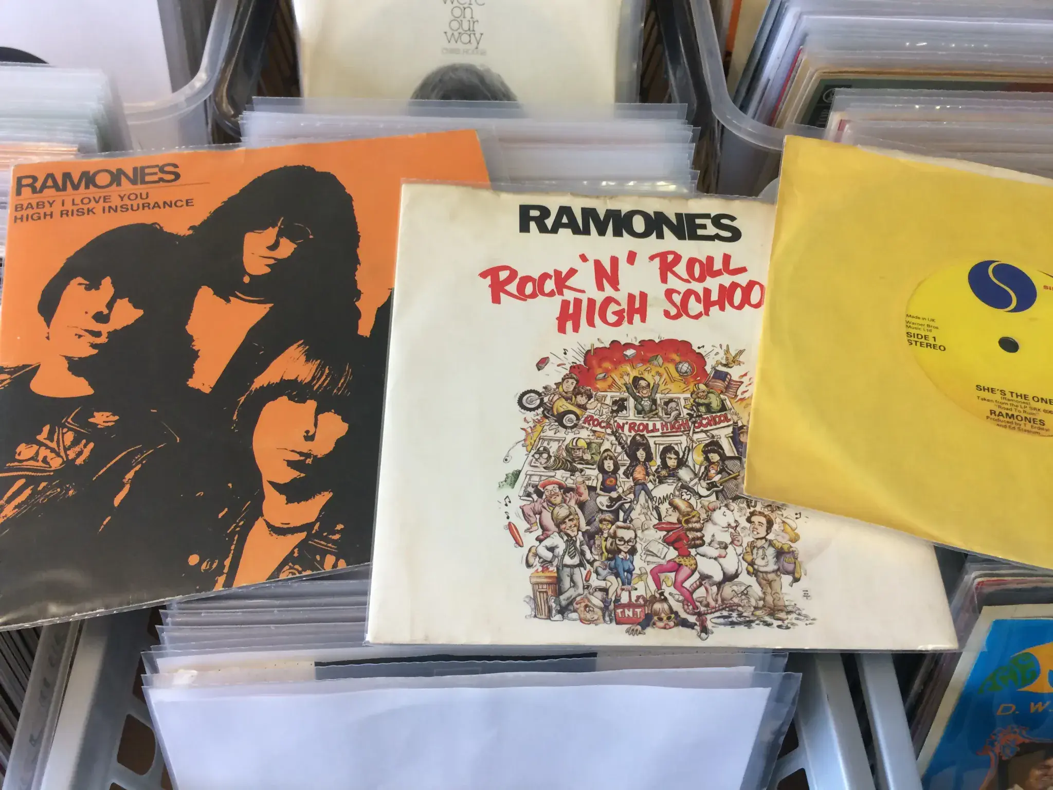 Good condition record sleeves showing visible edge wear, minor seam splits, or ring wear.