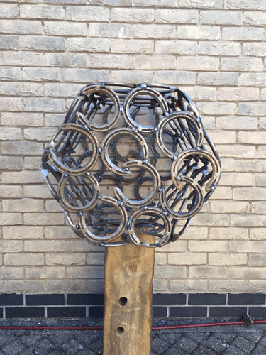 Hexagonal horseshoe sculpture, 60cm x 60cm