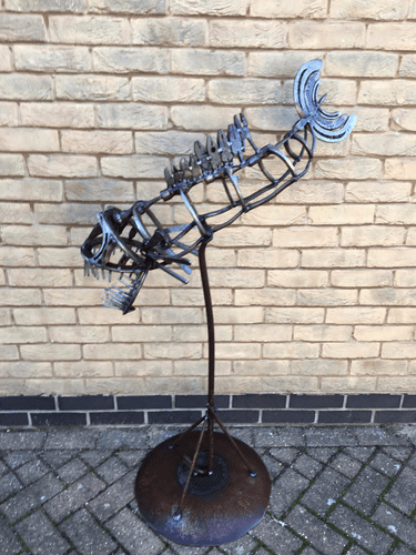 Large skeletal fish sculpture