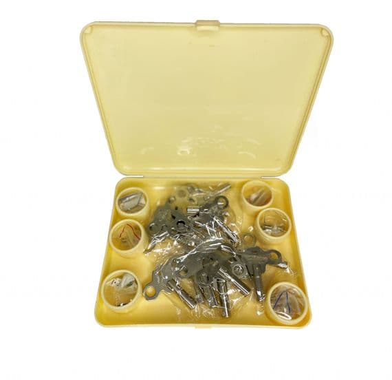 Assortment of 36 Clock Winding Keys in Storage Box. J2065