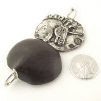 A unique, beautifully sculpted Unicorn decision maker pendant
