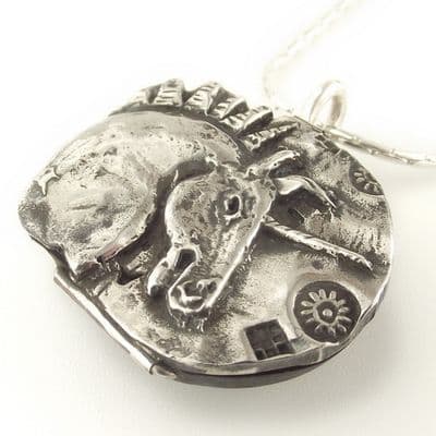 A unique, beautifully sculpted Unicorn decision maker pendant