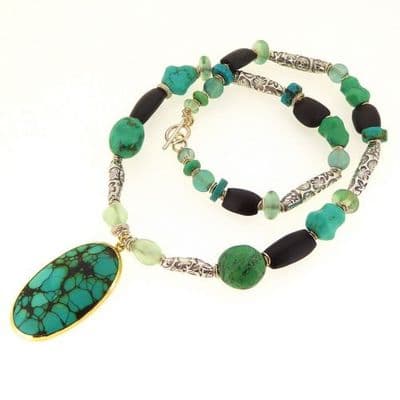 A unique, one of a kind, large Turquoise pendant necklace