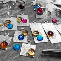 Amber earrings handmade from sterling silver, asymmetrical design, gemstone choice. S.