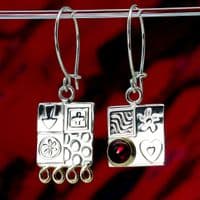 Amber earrings handmade from sterling silver, asymmetrical design, gemstone choice. S.
