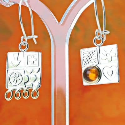 Amber earrings handmade from sterling silver, asymmetrical design, gemstone choice. S.
