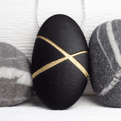Black Pebble pendant with golden lines, nature inspired