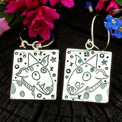 Dog earrings, polished silver