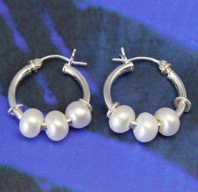 Freshwater pearl hoop earrings, three pearl sleeper earrings.