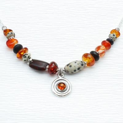Handmade Amber necklace with various amber stones and wooden bead