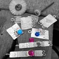 Handmade matching long  sterling silver earrings featuring two beautiful Amber stones