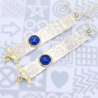 Handmade matching long  sterling silver earrings featuring two beautiful Amber stones