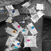 Handmade pendant from our Asymmetrical range. Sterling silver with a red opal. Gemstone choice.