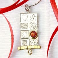 Handmade pendant from our Asymmetrical range. Sterling silver with a red opal. Gemstone choice.