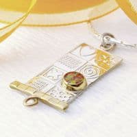 Handmade pendant from our Asymmetrical range. Sterling silver with a red opal. Gemstone choice.