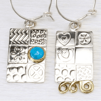Handmade sterling silver asymmetrical earrings, featuring a blue Opal gemstone, embossed silver.  .