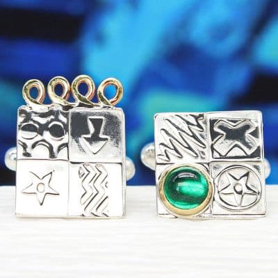 Handmade sterling silver cufflinks, asymmetrical with a green spinel stone. Gemstone choice