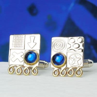 Handmade sterling silver cufflinks with Blue Spinel gemstones, embossed shapes and decorative hoops