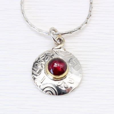 Handmade sterling silver pendant, round with a Garnet gemstone.  Stone choice available.