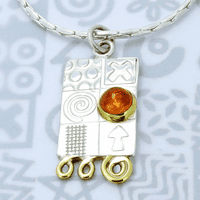 Handmade sterling silver pendant with a garnet gemstone and silver chain.  M. Gemstone choice.