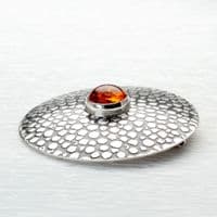 Handmade sterling silver Shagreen pattern brooch featuring a 10mm Amber stone