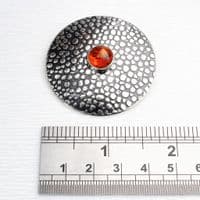 Handmade sterling silver Shagreen pattern brooch featuring a 10mm Amber stone